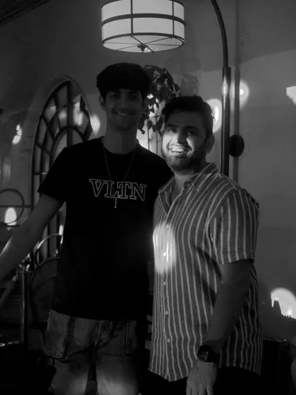 A candid moment between our resident DJ Abhin Malik and guest DJ Farhan Rehman. There's a real sense of community among the artists who perform here.