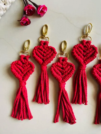 A collection of my red heart macrame keychains. These are always a bestseller around Valentine's Day and make great party favors for love-themed events.
