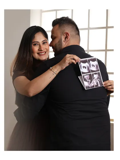 Bringing your sonogram pictures to the shoot is a wonderful way to celebrate the very first glimpse of your baby. It adds a deeply personal and emotional layer to your couple maternity photos.