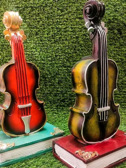 Our violin piggy banks are available in two classic colors, red and yellow. They make a thoughtful and artistic gift for both kids and adults.