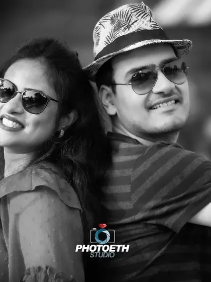 A stylish black and white portrait of the couple. Monochrome photos add a touch of timeless elegance and focus purely on expression and connection.