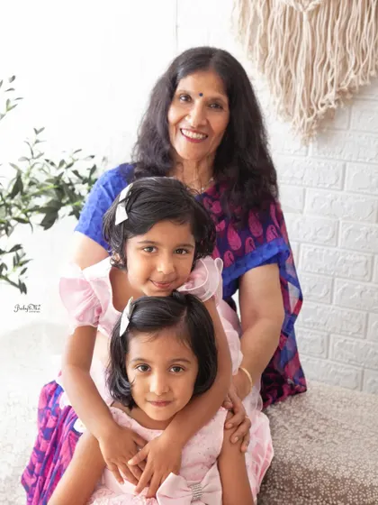 Grandmas are the coolest, and they give the best hugs. This portrait of a grandmother with her two granddaughters is just overflowing with love.