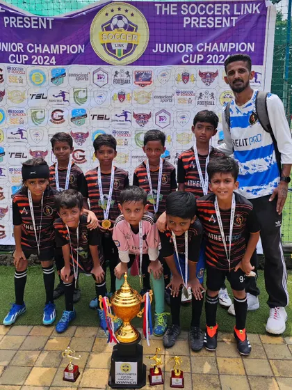 Our U9 team celebrating their championship win at the Juniors Football Cup 2024.