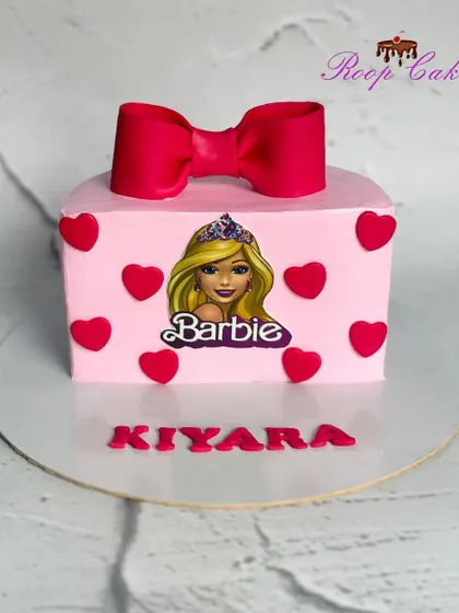 A half-birthday Barbie theme cake, perfect for a little one who is six months old and already a star.