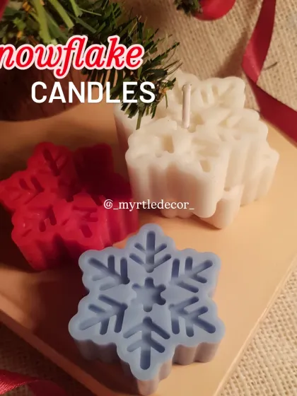 A trio of our Snowflake Candles in red, white, and blue. We love grouping them together to create a small, festive cluster on a mantelpiece or side table.