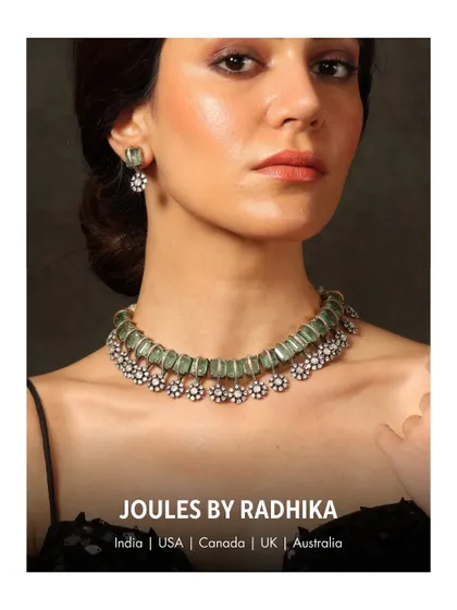 A product shot of the beautiful mint-green and polki floral choker worn by Kriti Sanon.