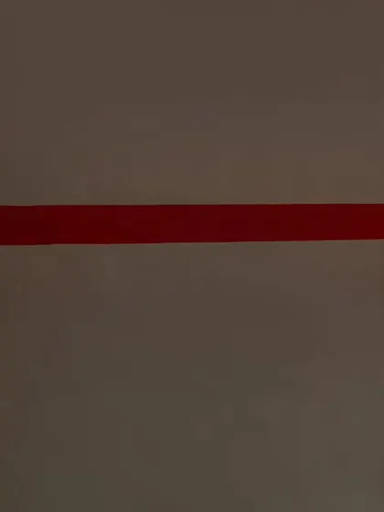 A creative composition using colored gels and separate doorways to create a sense of connection despite the distance.