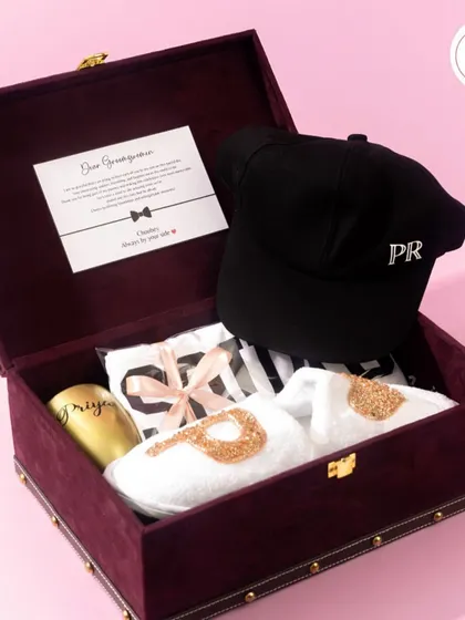 Inside the groom's woman hamper, complete with a personalized note card. It's a thoughtful way to honor the special women in the groom's life.