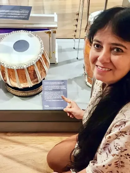 Here I am at the museum, next to a Tabla set and a description of my work, celebrating trailblazing women in South Asian music.