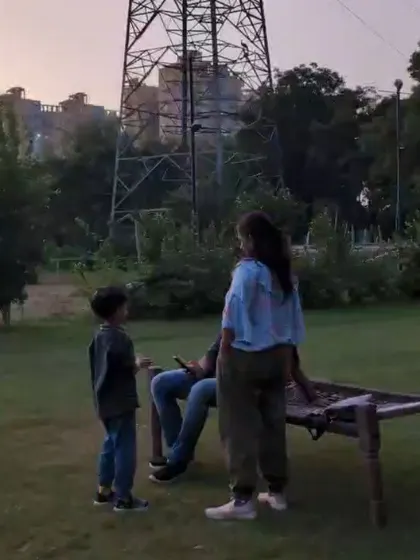 A family enjoying the quiet evening on the farm before the stargazing begins.