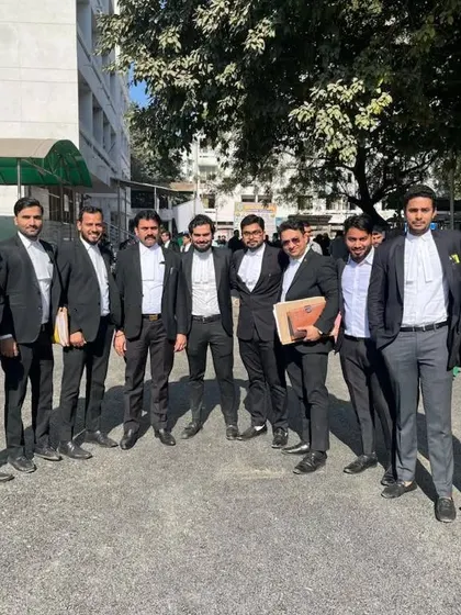 A group of us outside the court. The camaraderie among lawyers is a great source of strength.