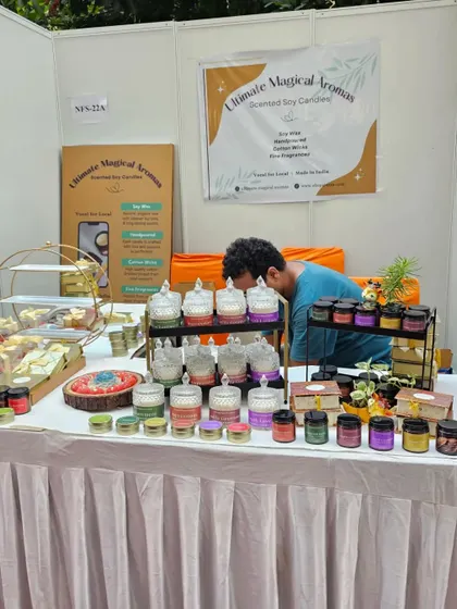 My brother helping set up the stall. My family's support is a huge part of this journey, and I couldn't do it without them.