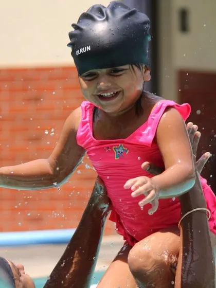 The joy of being lifted up in the water! These playful moments are a huge part of our infant swimming lessons, making learning feel like a game.