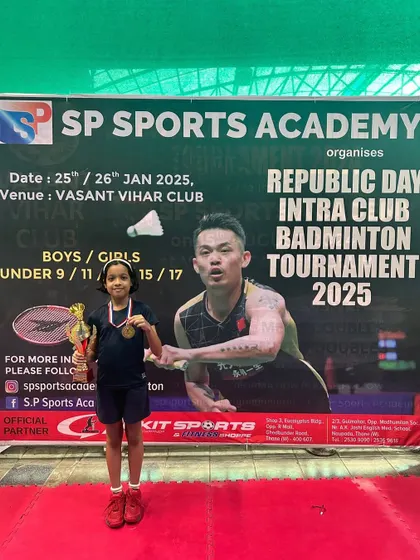 Our U-11 Girls winner, Ira Purohit, with her championship trophy.