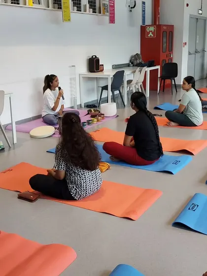 An interactive moment during our session at IKEA. I encourage questions and dialogue to ensure everyone understands the purpose behind the movements and practices.