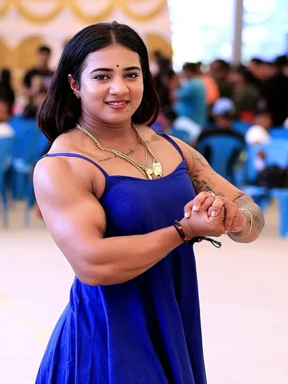 Another confident pose during my bulking season. I enjoy attending events and sharing my progress with the community.