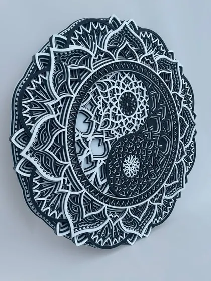 This perspective showcases the dimensionality of our wooden mandala art. The raised layers create shadows that shift throughout the day, making the art feel alive.