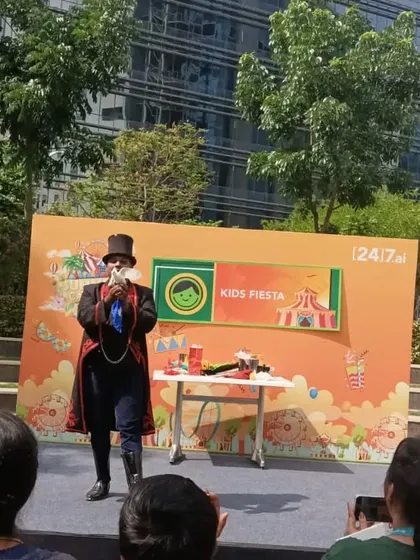 Performing a classic rope trick during the Kids Fiesta at 24/7.ai. This is a great piece of visual magic that plays well for a large, spread-out audience in an outdoor setting.