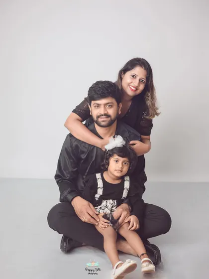 A classic family pose that radiates warmth and togetherness. These are the portraits that become treasured family heirlooms.