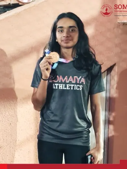 Swanandi Sawant with her gold medal won for the 400m Hurdles at the state school games athletics meet.