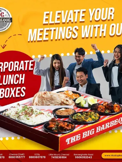 Happy teams are well-fed teams. This image shows colleagues celebrating over one of our large corporate meal boxes, perfect for team lunches, meetings, and office parties.