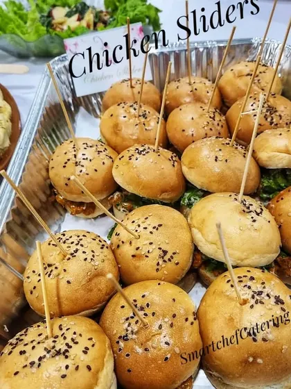 A tray of our savory chicken sliders, a great non-vegetarian option for parties and events.