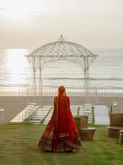From local celebrations to global destinations. We are equipped and experienced in capturing beautiful weddings anywhere in the world, like this stunning bride against a serene beach sunset.
