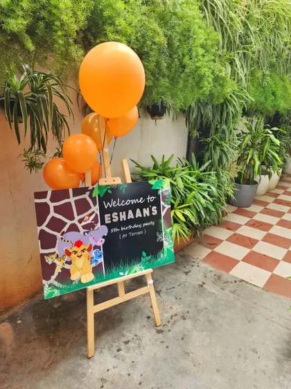 A personalized welcome sign for "Eshaan's 5th Birthday Party," featuring a fun jungle theme.