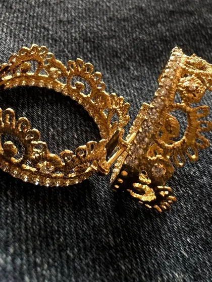 Another view of the 18k gold and diamond filigree hoops. The openwork design makes them surprisingly lightweight and comfortable to wear, while still making a statement.