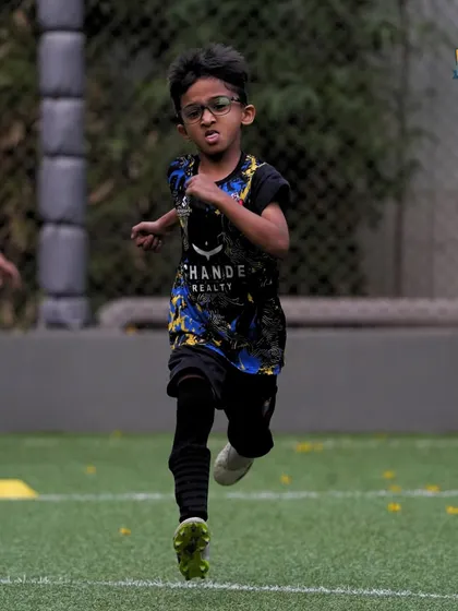 The look of pure effort. This young player gives his all during an endurance drill, building the engine needed to outlast opponents.