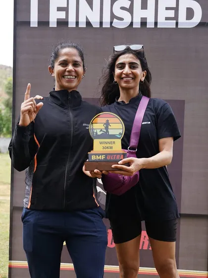 Celebrating a win at the BMF Ultra with a trainee. My victories are also theirs. Seeing my athletes succeed and find joy in the sport is one of the most rewarding parts of being a coach.
