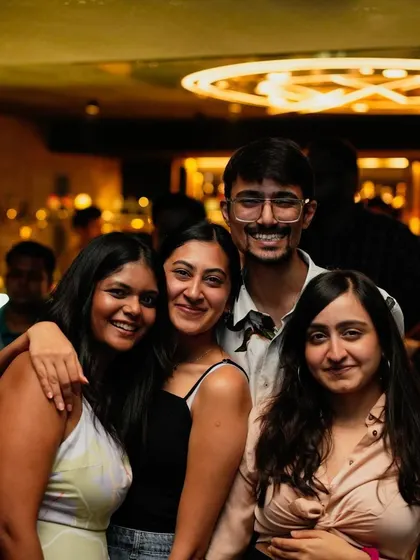 A duplicate of the 'Friday Switch' group. Their smiles show they're ready for the weekend.
