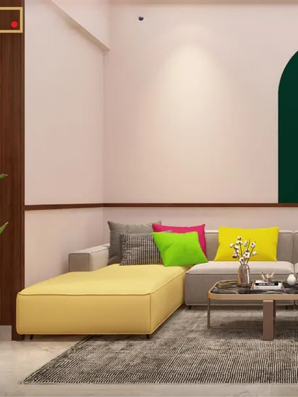 A close-up of the colorful L-shaped sofa. The bright yellow and pink cushions add a joyful pop of color to the neutral sofa, proving that small details can make a big impact.