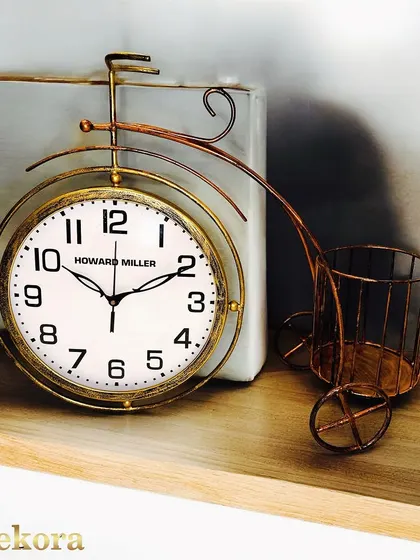 This vintage-inspired table clock is designed as a miniature tricycle, complete with a small basket. It's a charming and functional desk accessory that makes for a unique corporate giveaway.