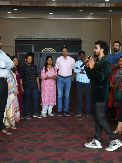 Getting a group of parents together for an interactive game on stage.