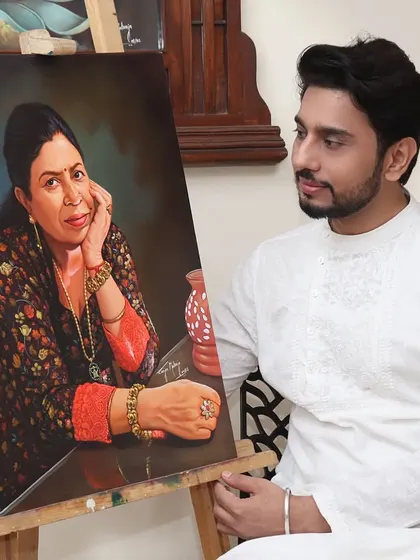 With the portrait I painted of my mother. Her blessings and her memory are the driving force behind my art and my life. This painting is my way of keeping her close to me always.