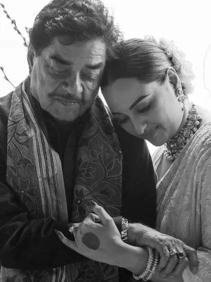 A father and daughter share a hug filled with a lifetime of unspoken love. We’ve grown up seeing him on screen, but in this moment, he was just a father holding his daughter on her wedding day.