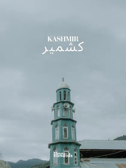 The word "Kashmir" set against the backdrop of a mosque's minaret. This image establishes the unique sense of place for this pre-wedding story.