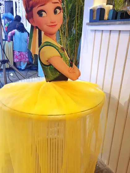 Custom props can be functional too, like this table designed to look like Princess Anna's dress from Frozen.