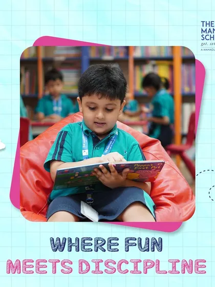 Where fun meets discipline. A student enjoys a quiet moment of reading in a beanbag chair, showing how we balance active play with focused learning.