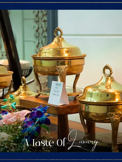 Another angle of our beautiful brass serveware, highlighting the intricate design on the legs and lid. This image reinforces the "Taste of Luxury" we promise to deliver.