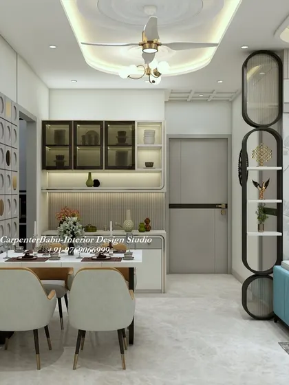 This view shows the dining area with its custom crockery unit and a stylish partition made of vertical black bars, which adds a modern, industrial touch.