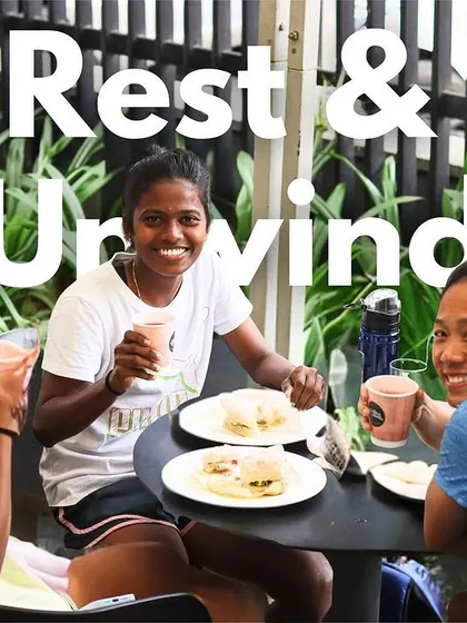 Recovery is also about connection and rest. This image shows our athletes, including Bala Devi, taking a well-deserved break and unwinding together. It captures the sense of community and camaraderie that is a vital part of the RSF experience.