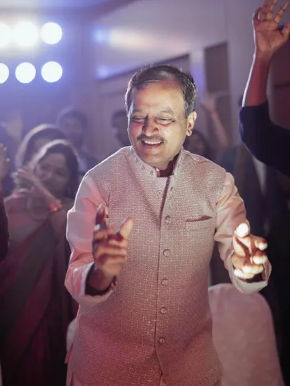 It's a successful event when every guest feels the music and joins the celebration. This guest is having a wonderful time on the dance floor at a Sangeeth I organized.