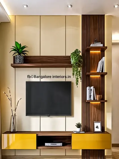 This TV unit design adds a pop of color with bright yellow drawers. The combination of cream panels, dark wood fluting, and asymmetrical shelving creates a playful yet sophisticated look with practical storage.