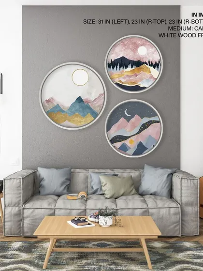 This set of three circular prints features abstract mountain landscapes at different times of day. The white wood frames and imaginative designs create a cohesive and artistic story for your wall.