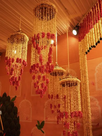Another view of the beautiful and intricate floral jhoomars, a classic element of Indian festive decor, handcrafted by our skilled artisans.