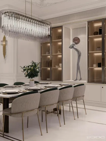The dining area in this neoclassical home is the epitome of opulent elegance. A modern crystal chandelier hangs above a marble-topped table, while custom glass cabinets display curated art and decor.