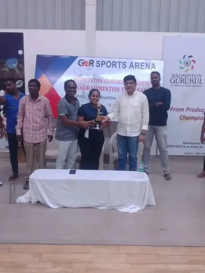 Our students from GMR Sports Arena receiving their awards at the annual Indoor Badminton Tournament.
