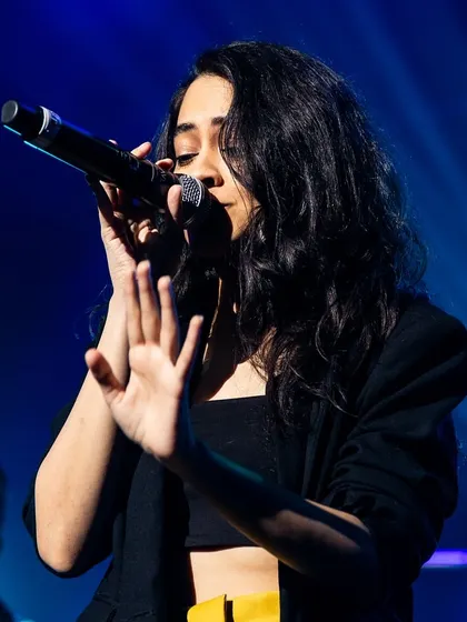 A close-up showing the emotion of the performance. I pour my heart into every song.